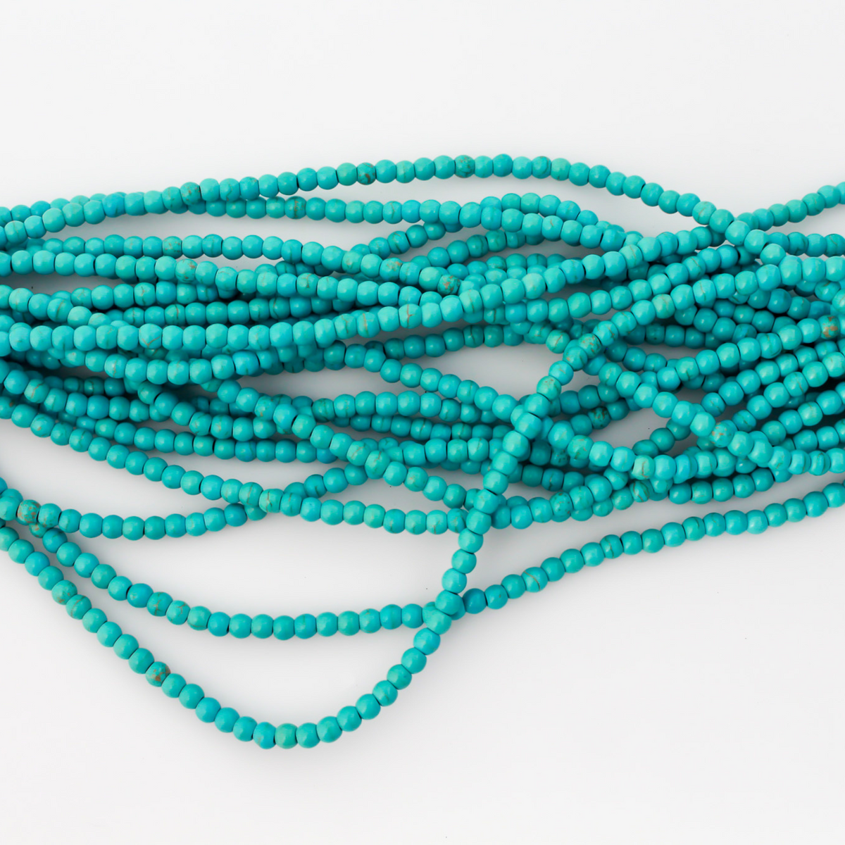 4mm round Beautiful synthetic howlite turquoise beads that are a practical alternative to real turquoise