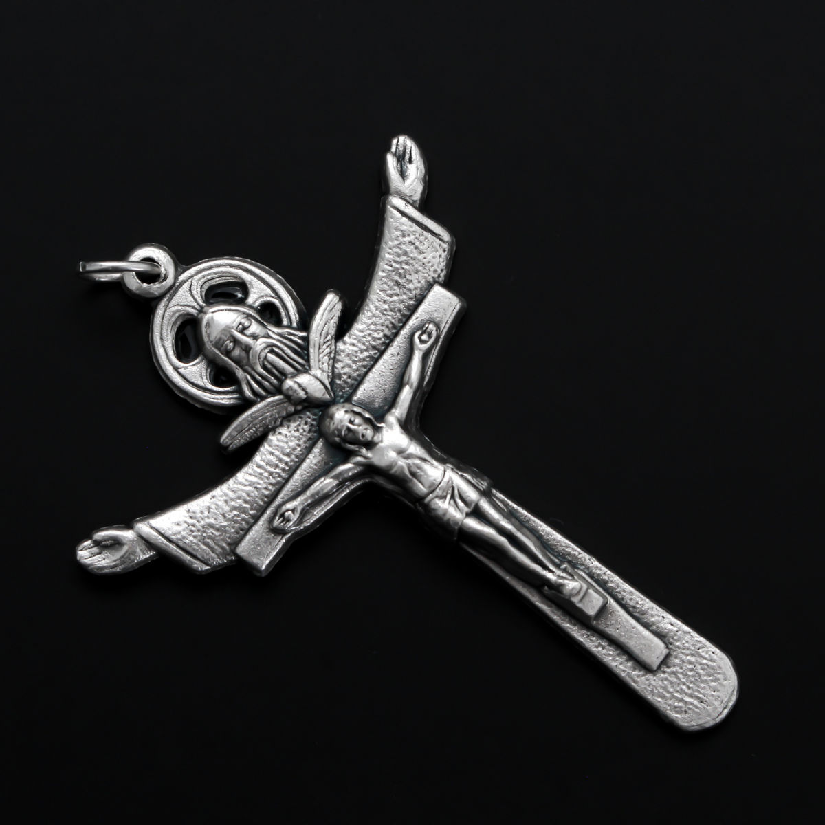 Holy trinity crucifix with the father, the son, and the holy ghost represented on the front of the crucifix. The backside of the cross is marked "Tertium Millennium" with the Greek letters Alpha and Omega