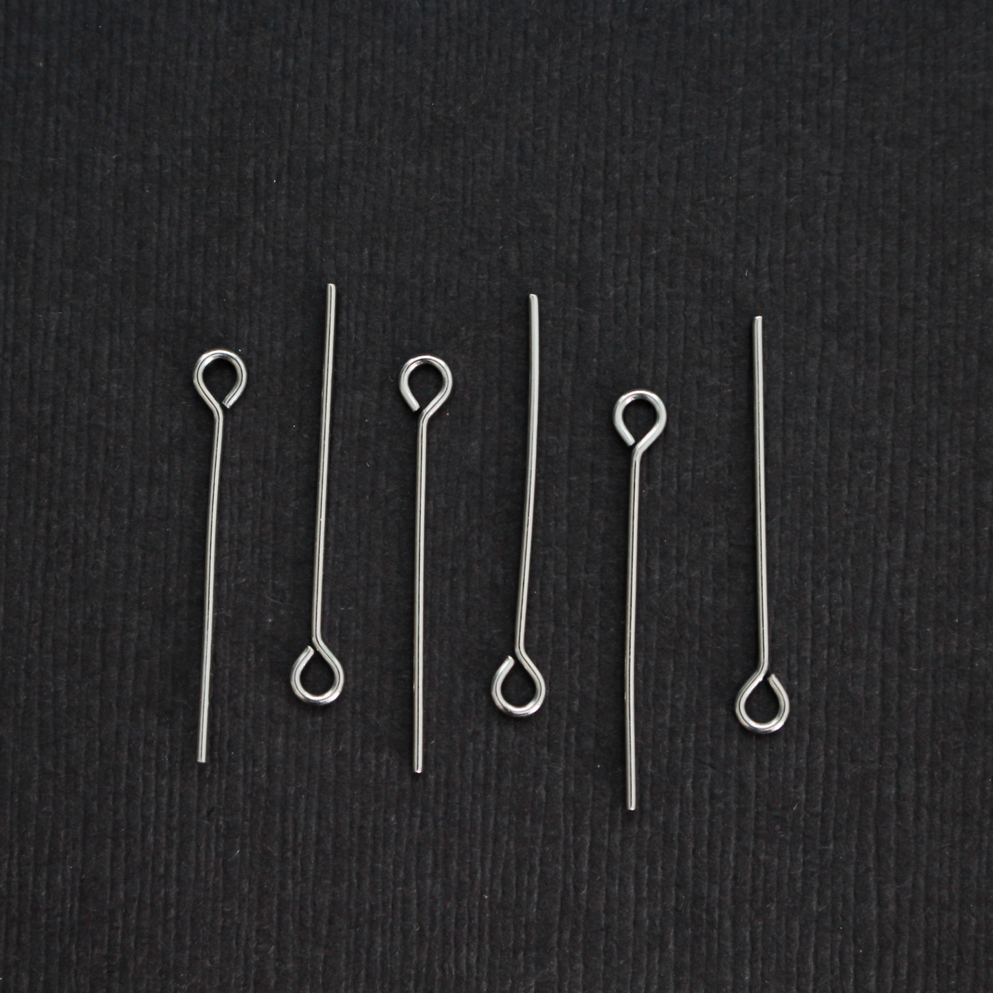 Solid stainless steel eye pins that are 25mm long