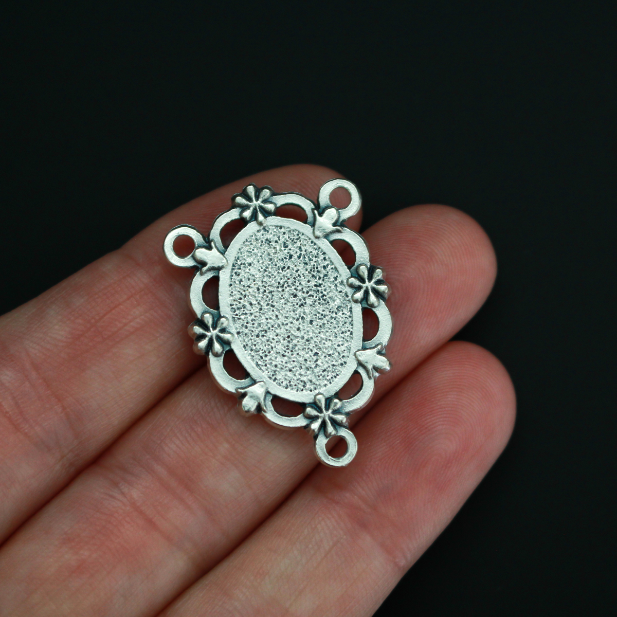 Our Lady of Guadalupe rosary centerpiece with filigree cut out design and floral detailing