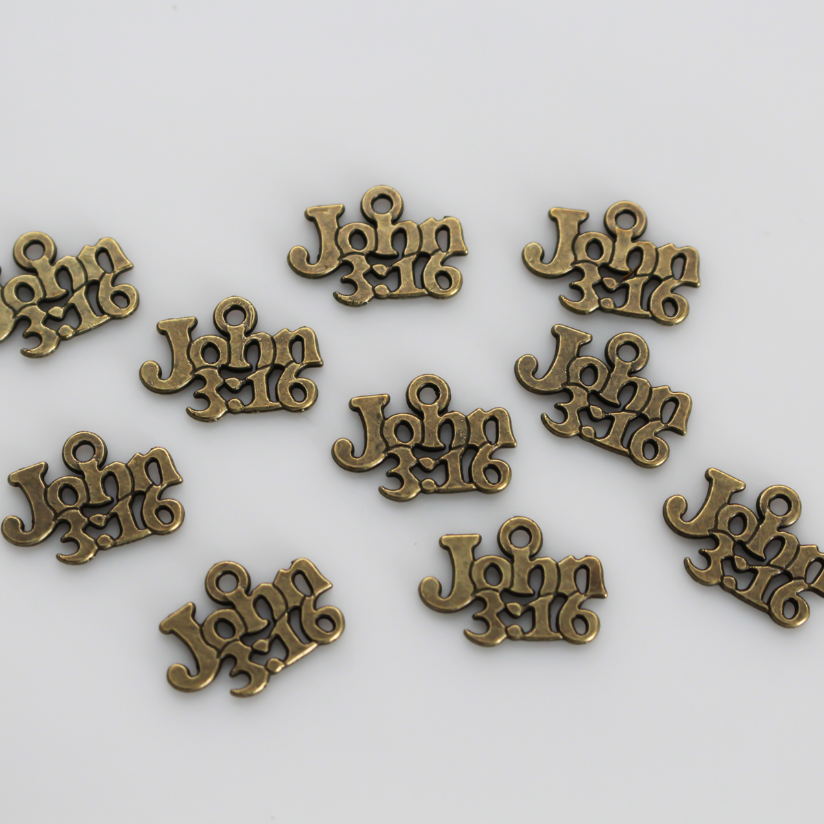 John 3:16 charms in antiqued bronze color, 19mm x 13mm