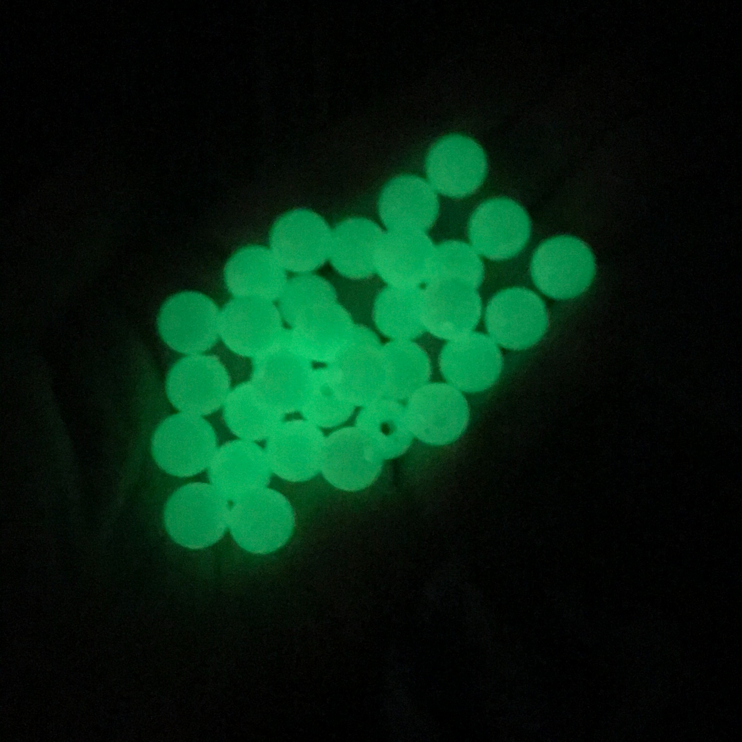 Luminous glow in the dark acrylic beads that are center drilled. They are a light pale green color when viewed in daylight. They glow green in the dark