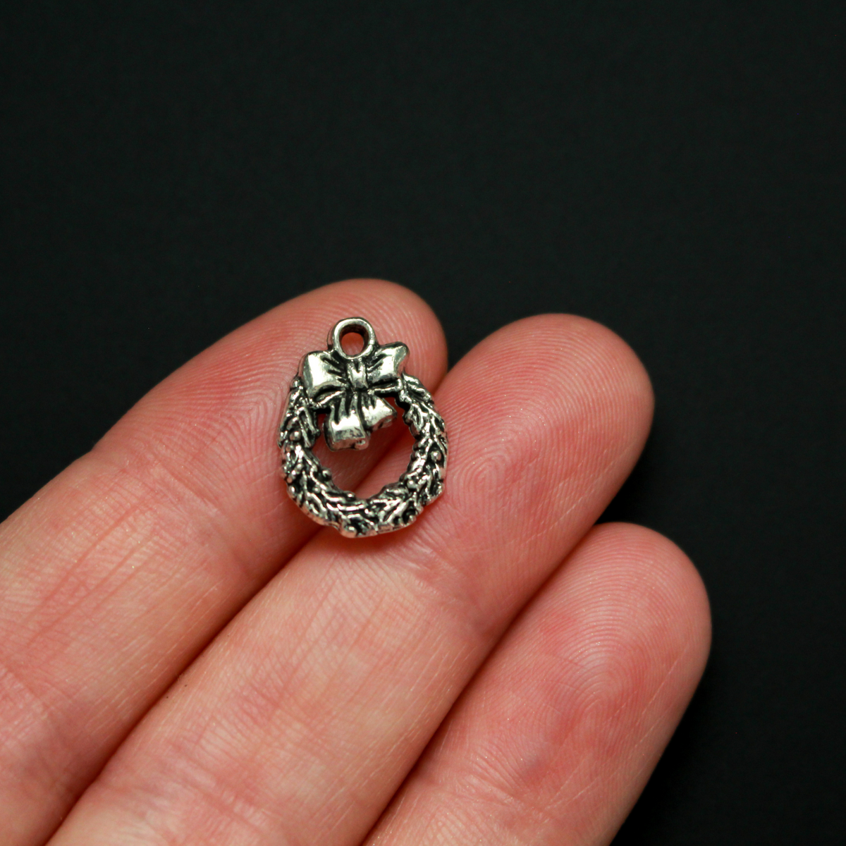 Silver tone Christmas wreath charms, 15.5mm long