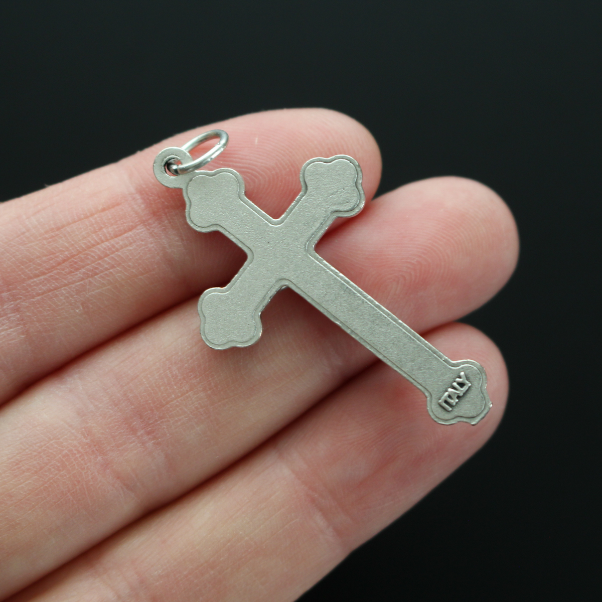 Orthodox Byzantine die-cast metal crucifix with a pearlized white enamel inlay