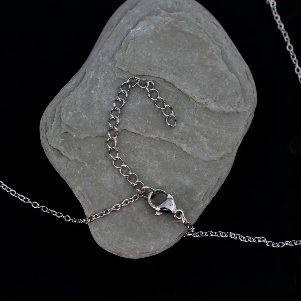 Stainless steel link cable chain necklace that features a lobster claw clasp for easy opening, 16 inches long