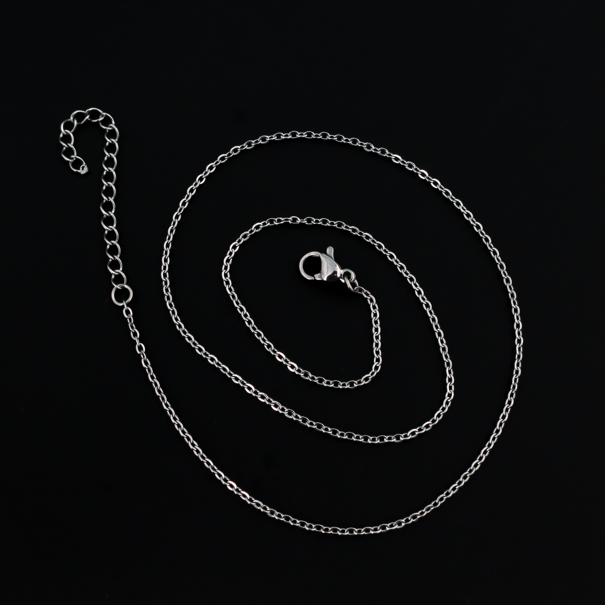 Stainless steel link cable chain necklace that features a lobster claw clasp for easy opening, 16 inches long