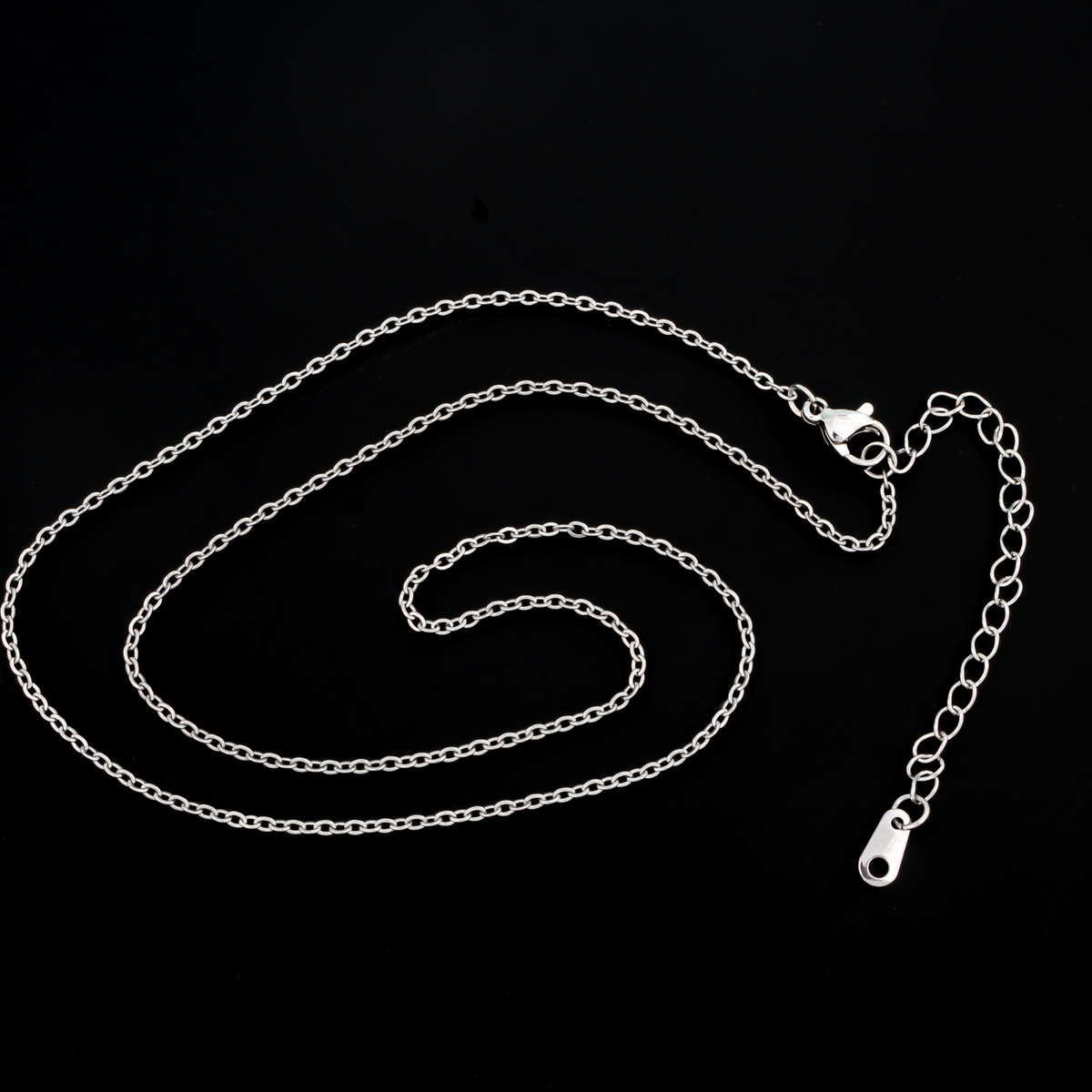 Stainless steel cable chain with an extender chain that also features a lobster claw clasp for easy opening