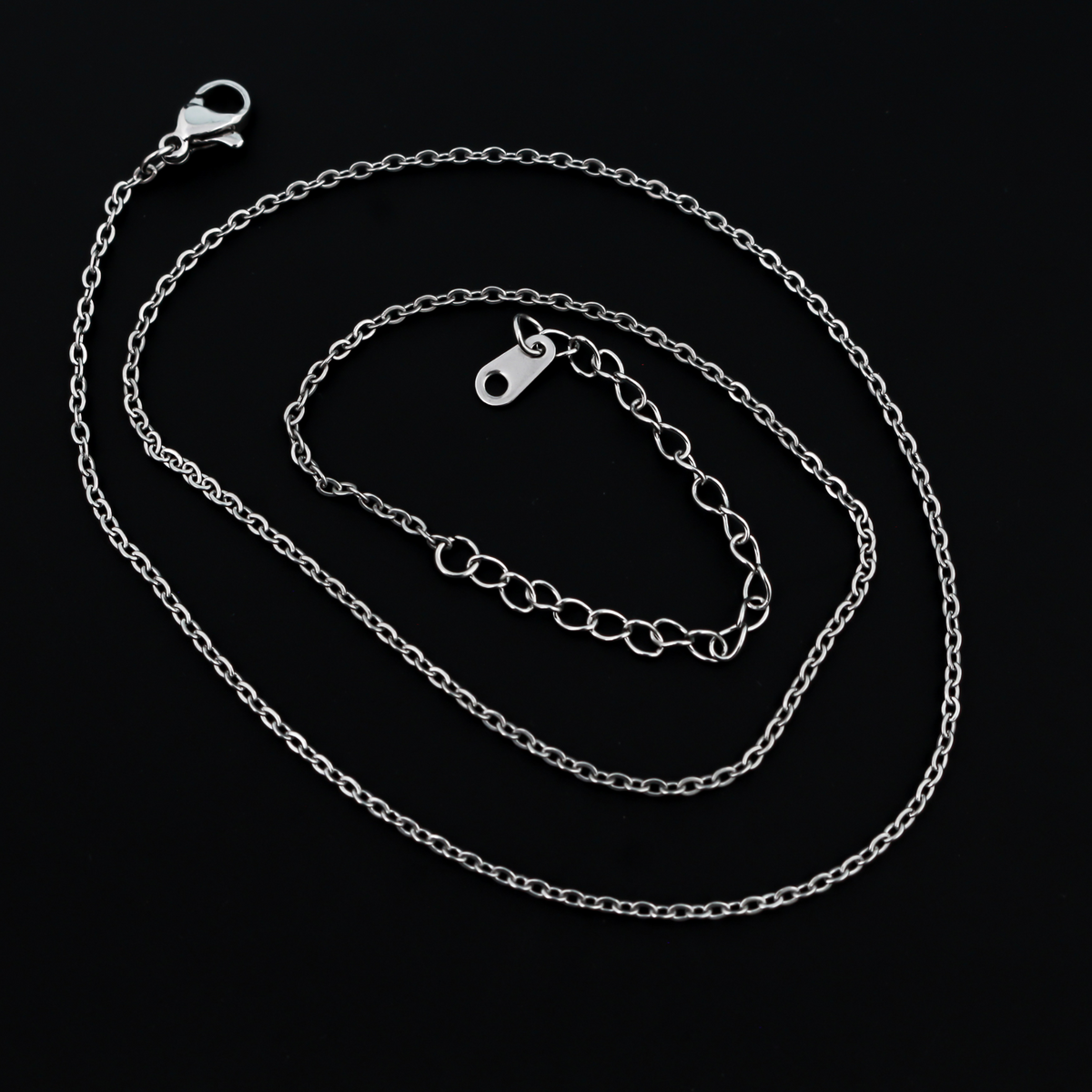 Stainless steel cable chain with an extender chain that also features a lobster claw clasp for easy opening