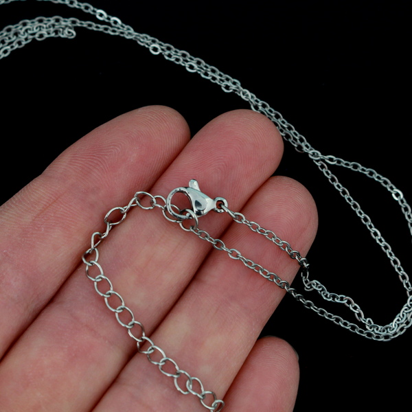 Stainless steel cable chain with an extender chain that also features a lobster claw clasp for easy opening