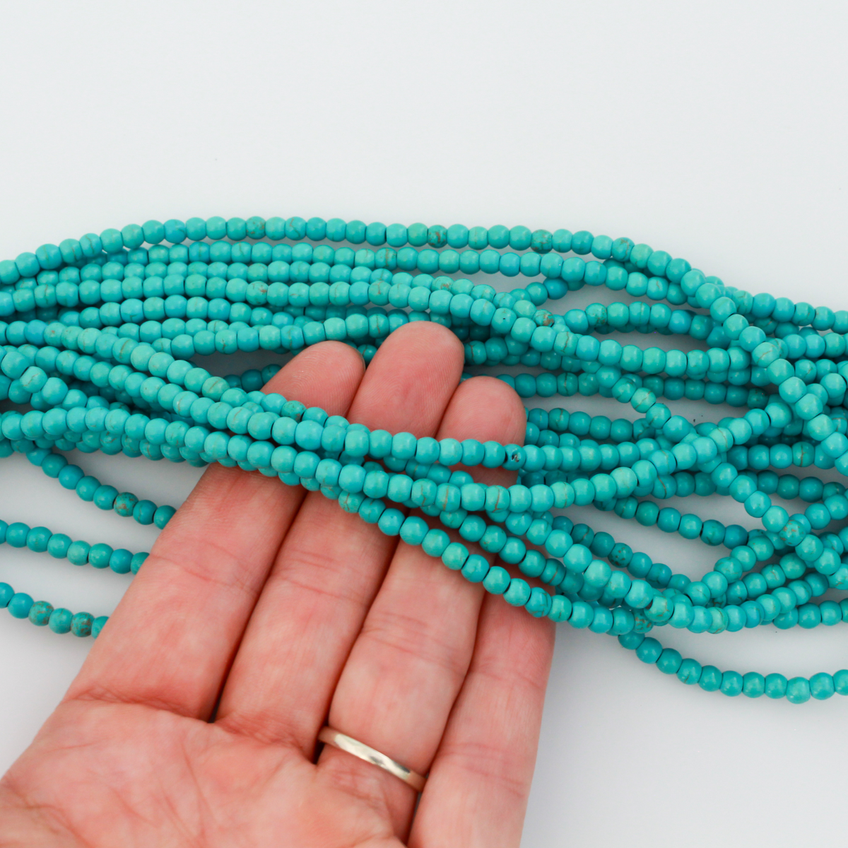 4mm round Beautiful synthetic howlite turquoise beads that are a practical alternative to real turquoise
