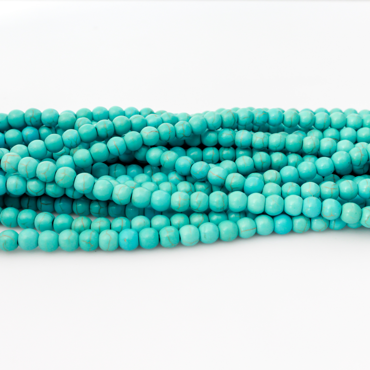 6mm round Beautiful synthetic howlite turquoise beads that are a practical alternative to real turquoise