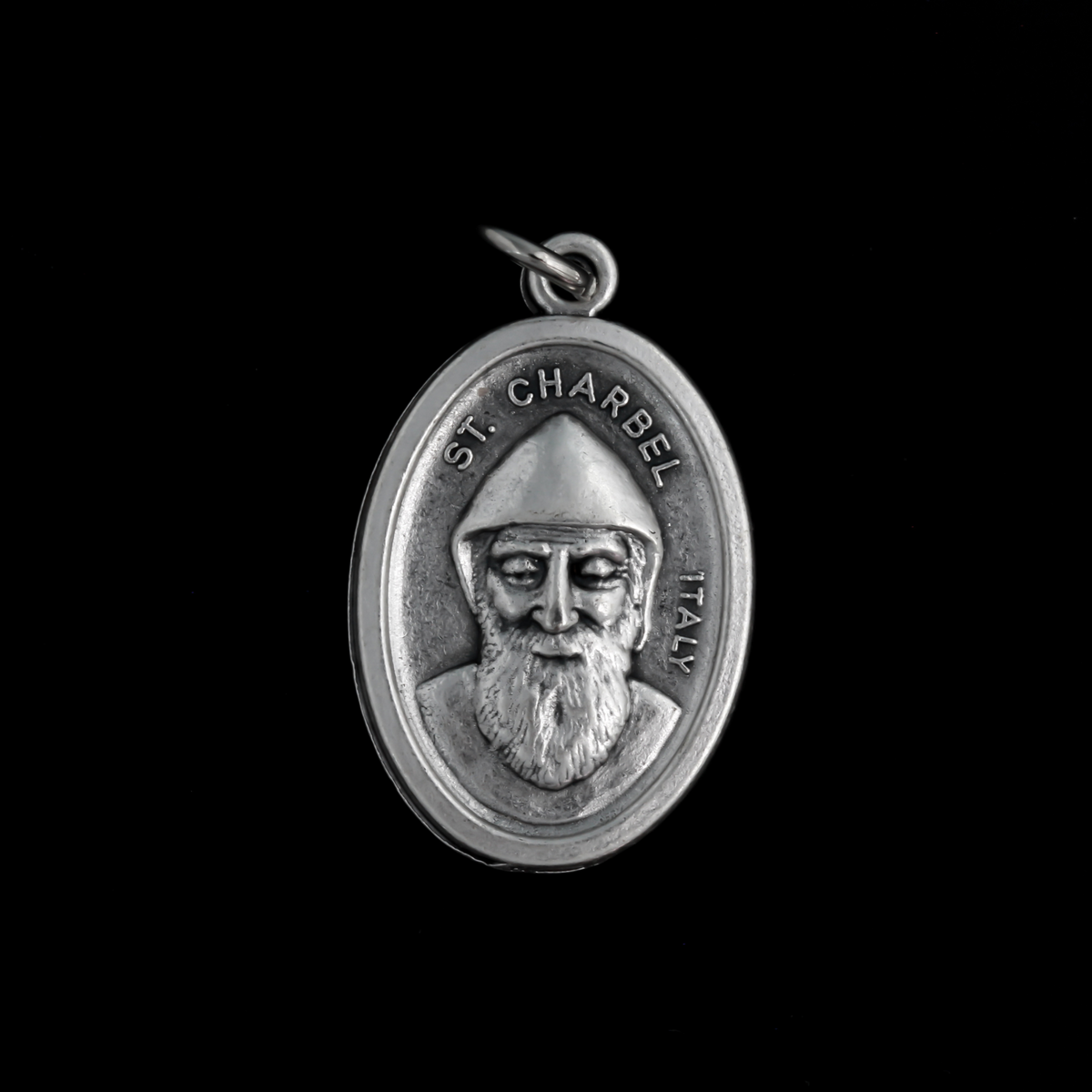 Saint Charbel medal that depicts the saint on the front and is marked "Pray For Us" on the backside.