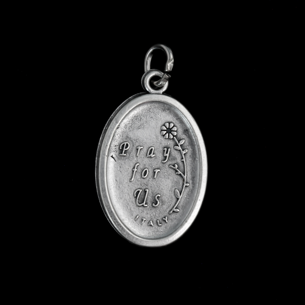 Saint Charbel medal that depicts the saint on the front and is marked "Pray For Us" on the backside.