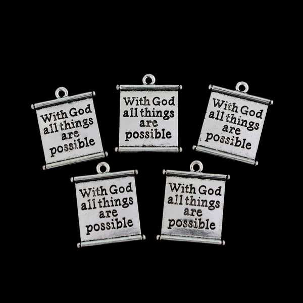 Matthew 19:26 Bible quote charms “With God all things are possible”. The charms are scroll shaped, the backside is blank.