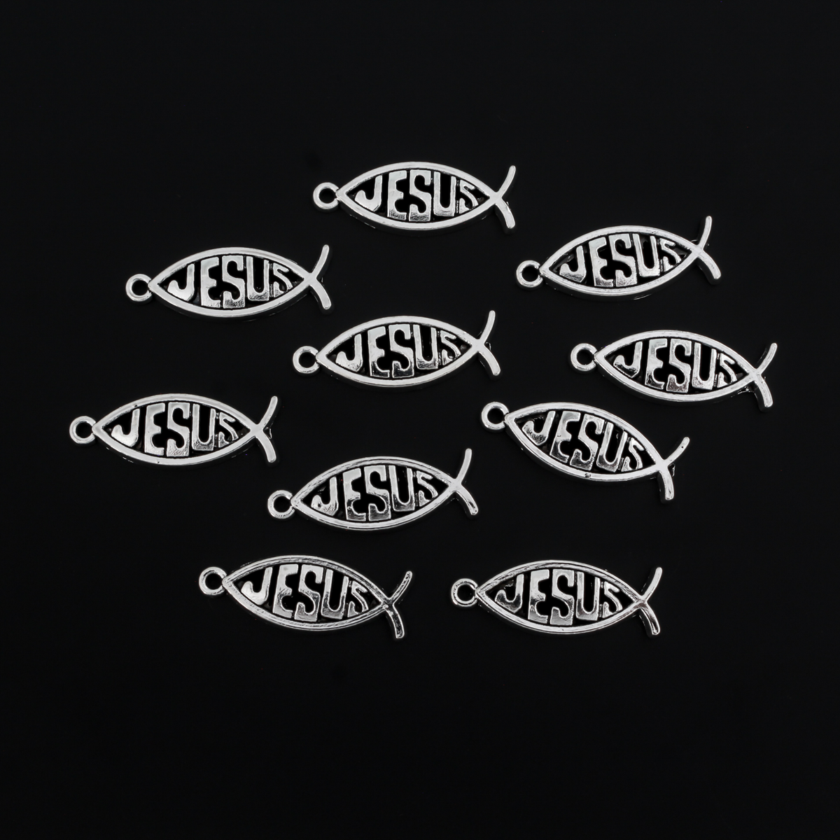 27mm long silver-tone Fish-shaped charm with Jesus spelled out in the center