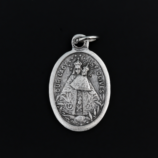 Our Lady of Olives medal that depicts the Blessed Virgin on the front and the Sacred Heart of Jesus on the back