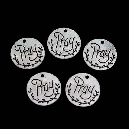 Flat, 20mm round charms engraved with the word "PRAY" with an olive branch detail beneath