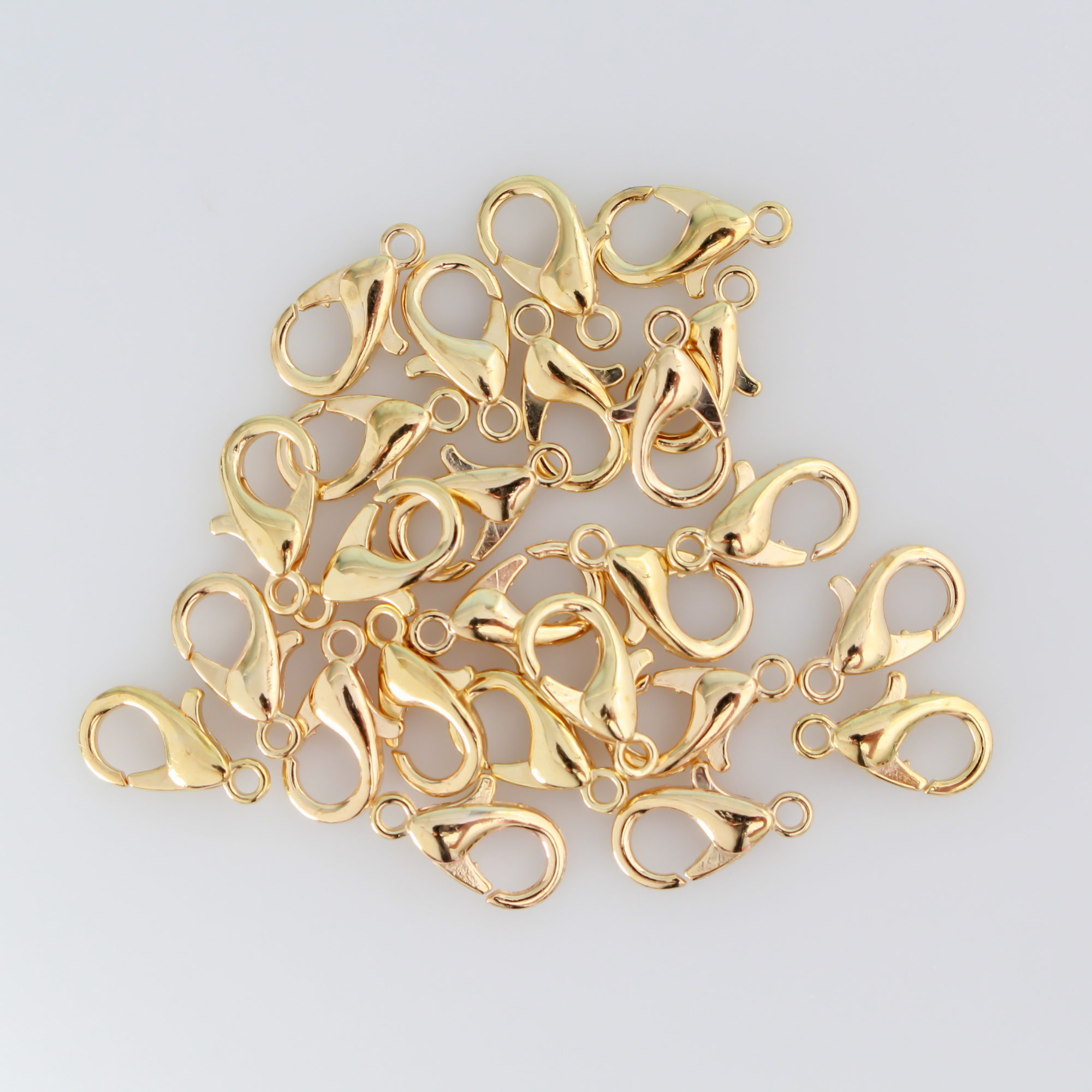 Light gold lobster claw findings, 12mm long by 6mm wide