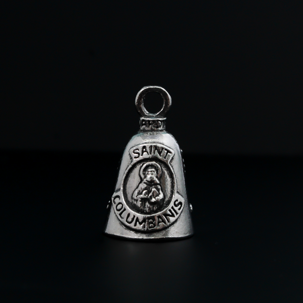 Saint Columbanus Guardian bell that depicts the saint on the front and is marked "Patron Saint of Motorcyclists" on the back.