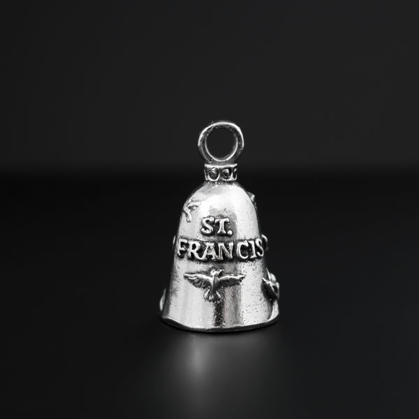 Saint Francis of Assisi Guardian bell that depicts the saint on the front and is marked "Saint Francis" on the back