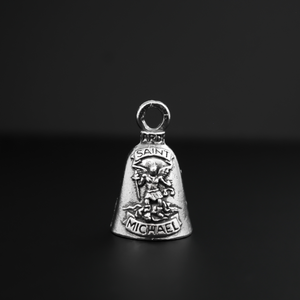 Saint Michael Guardian bell that depicts the saint on the front and is marked "Patron Saint of Law Enforcement" on the back