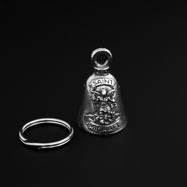 Saint Michael Guardian bell that depicts the saint on the front and is marked "Patron Saint of Law Enforcement" on the back