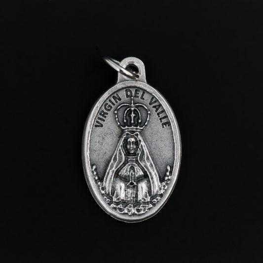 Virgin of the Valley medal that depicts Mary on the front and "Pray for us" on the back