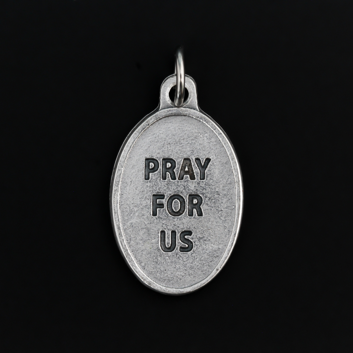 Virgin of the Valley medal that depicts Mary on the front and "Pray for us" on the back