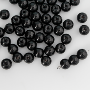 8mm round beads in a solid black color.