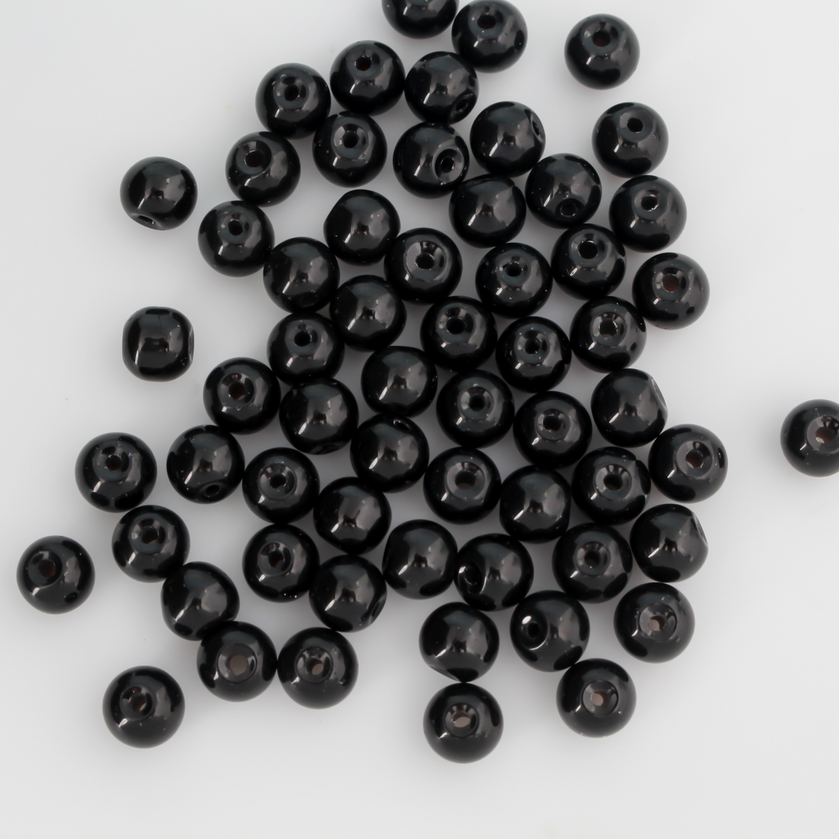 8mm round beads in a solid black color.