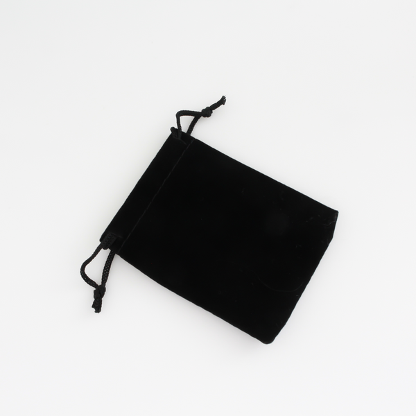 Small black velvet drawstring pouch that is 3.5" x 2.875"