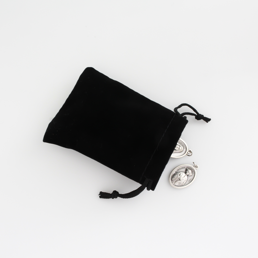 Small black velvet drawstring pouch that is 3.5" x 2.875"