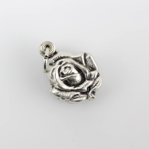 Sliding Rose Locket of Our Lady of Guadalupe in Spanish Ruega Por Nosotros