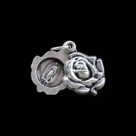 Sliding Rose Locket of Our Lady of Guadalupe in Spanish Ruega Por Nosotros