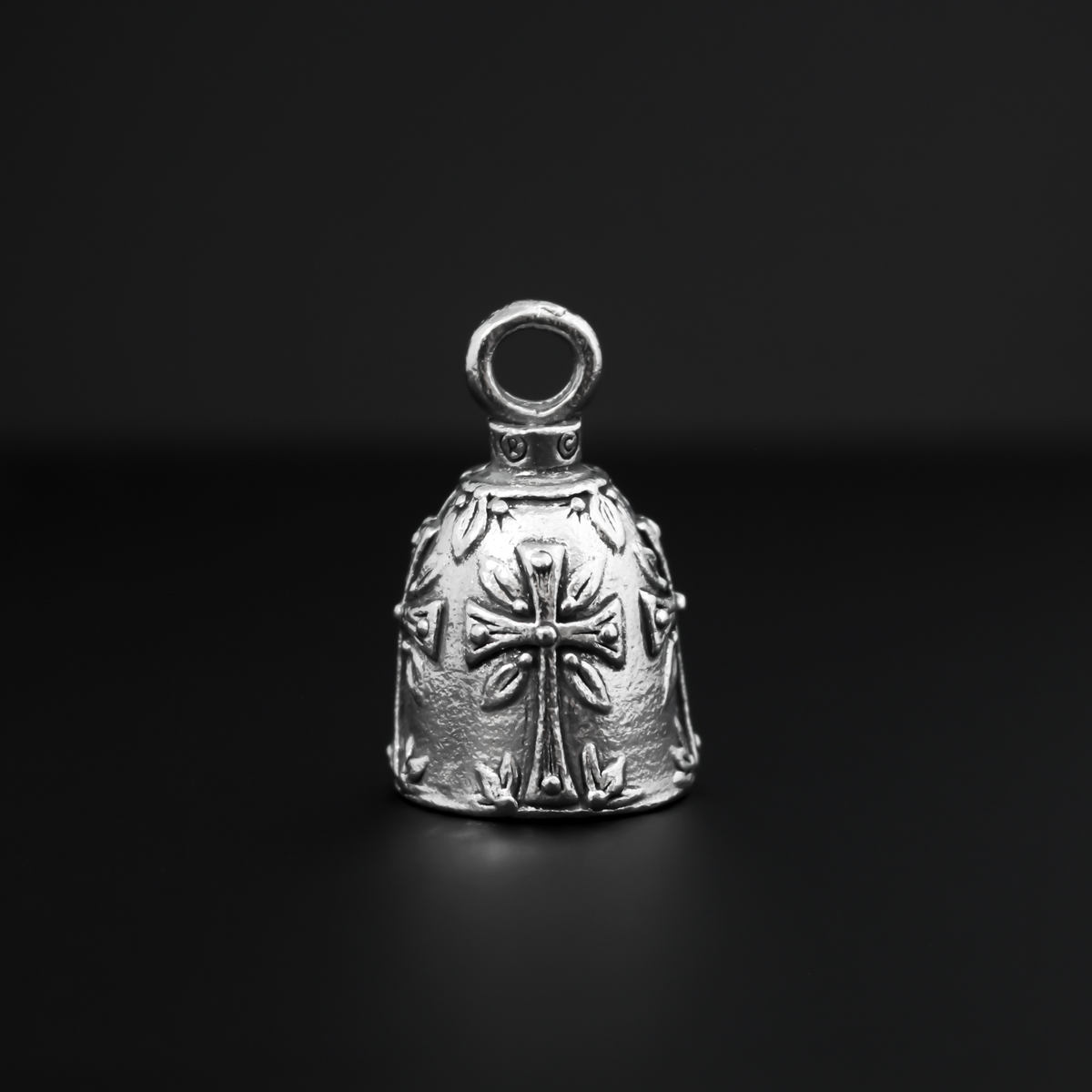 Christian Cross Guardian bell. There are four cross symbols encircling the bell.