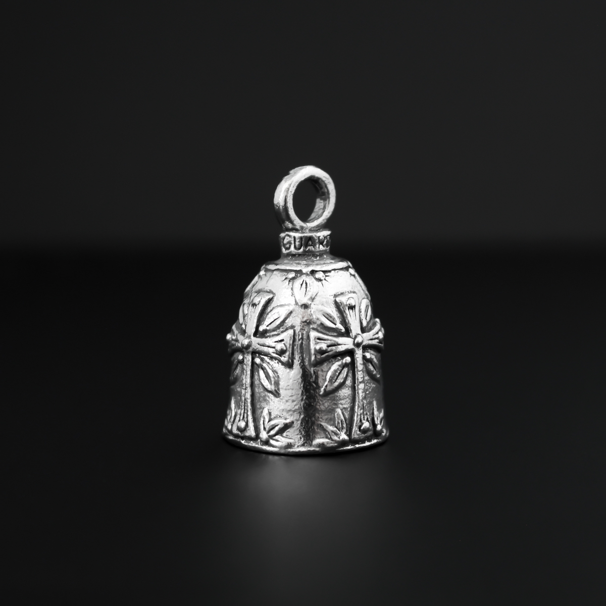 Christian Cross Guardian bell. There are four cross symbols encircling the bell.
