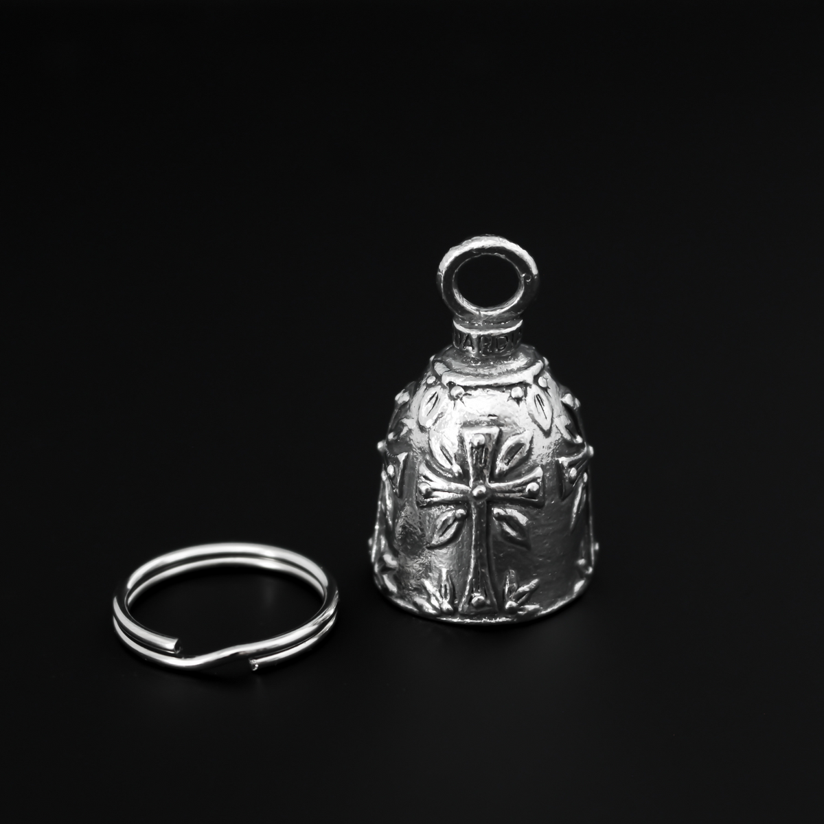 Christian Cross Guardian bell. There are four cross symbols encircling the bell.