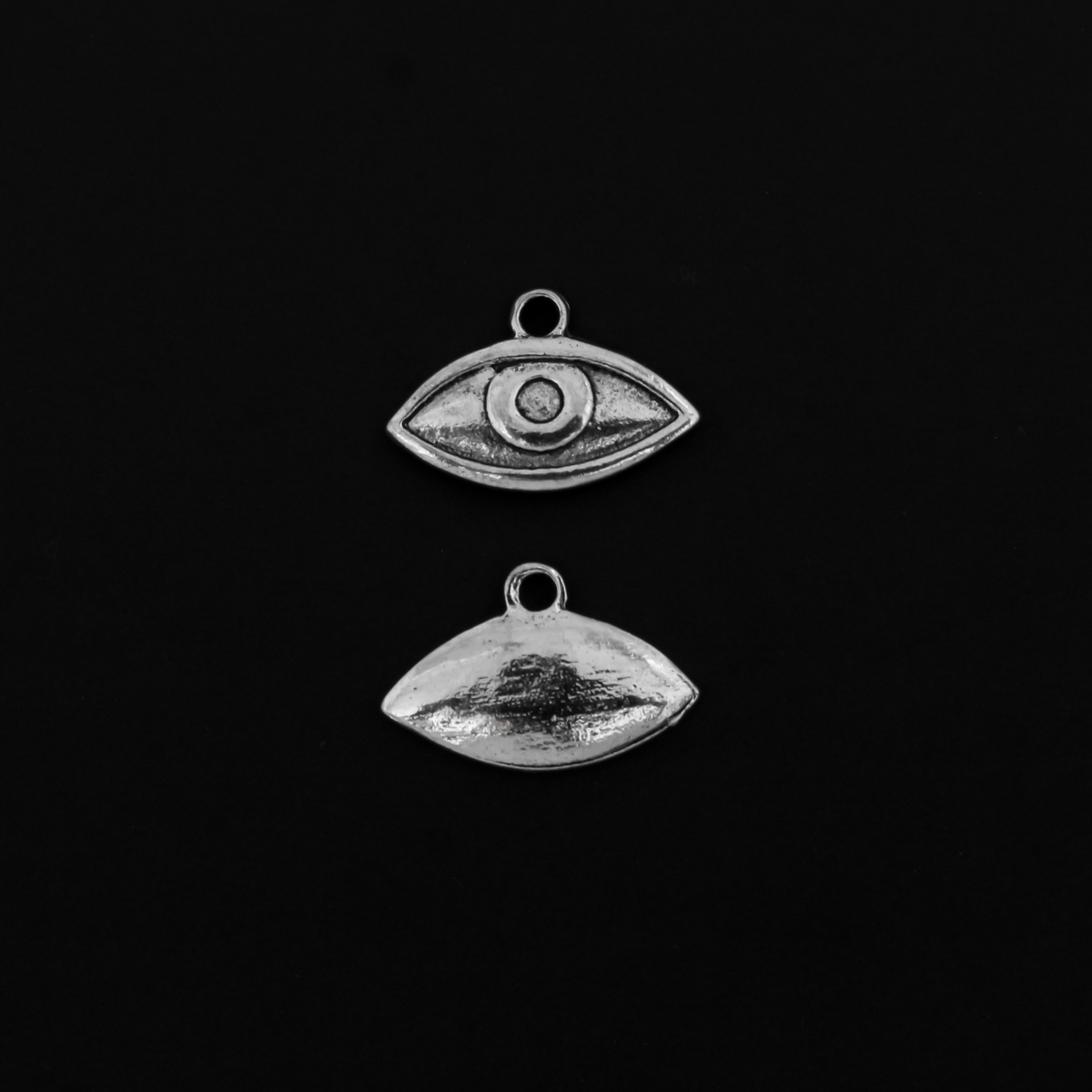 Human eye shaped charms in antiqued silver tone finish, 19mm x 13mm
