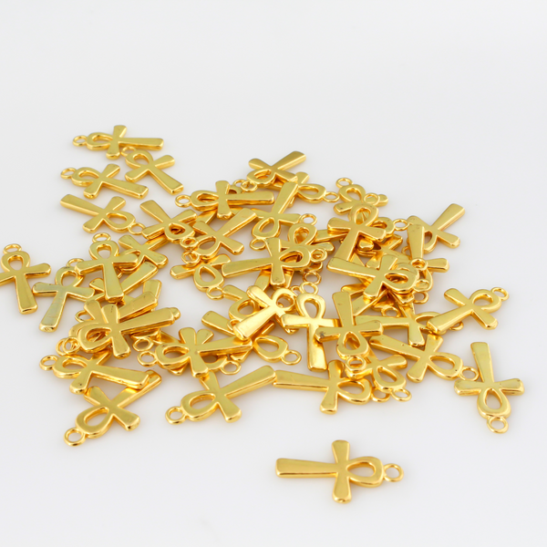 Egyptian Ankh cross charms that are a zinc alloy base with a shiny gold plating.