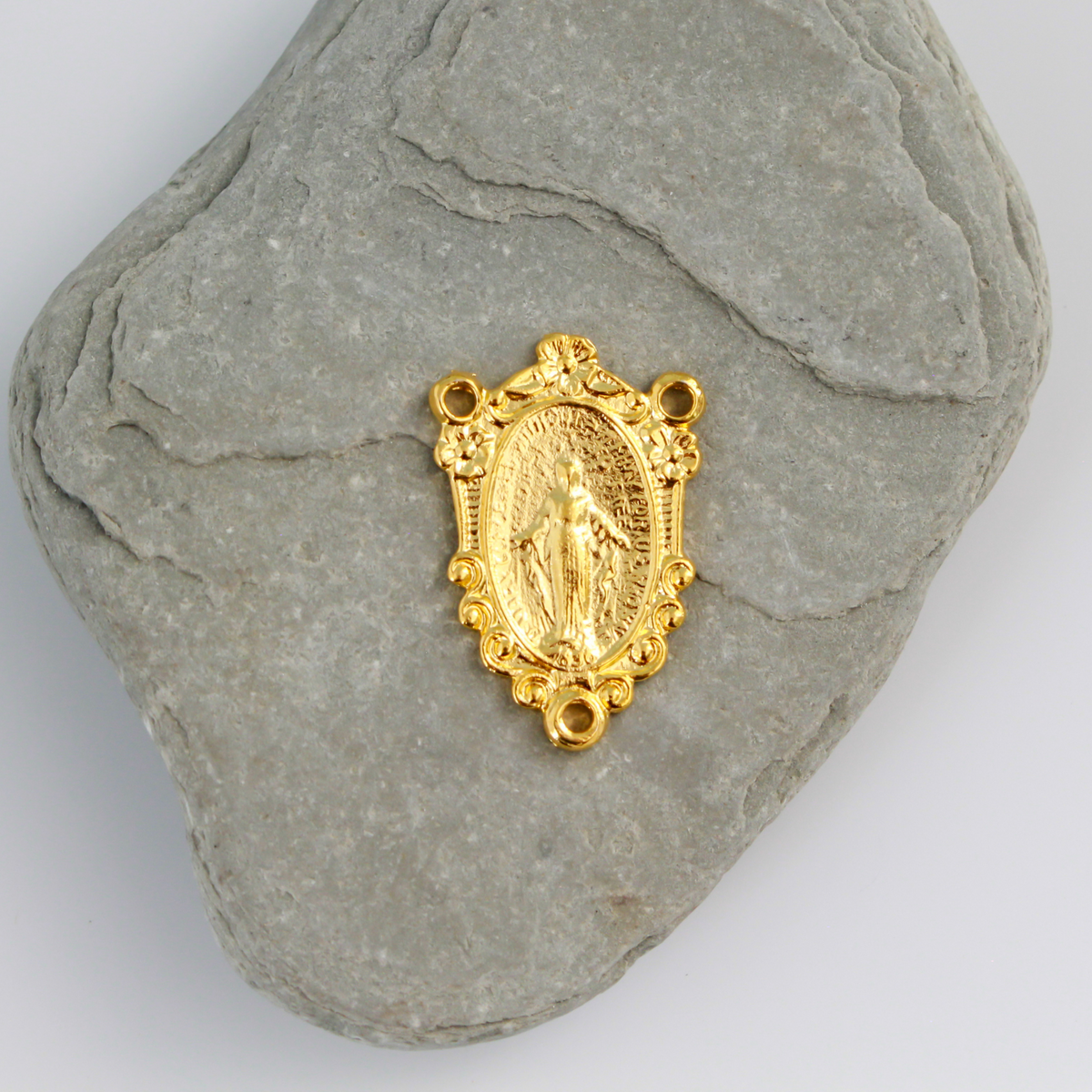 Traditional Miraculous Mary rosary centerpiece. This gold plated centerpiece has gorgeous detail and would be a lovely addition to your next rosary