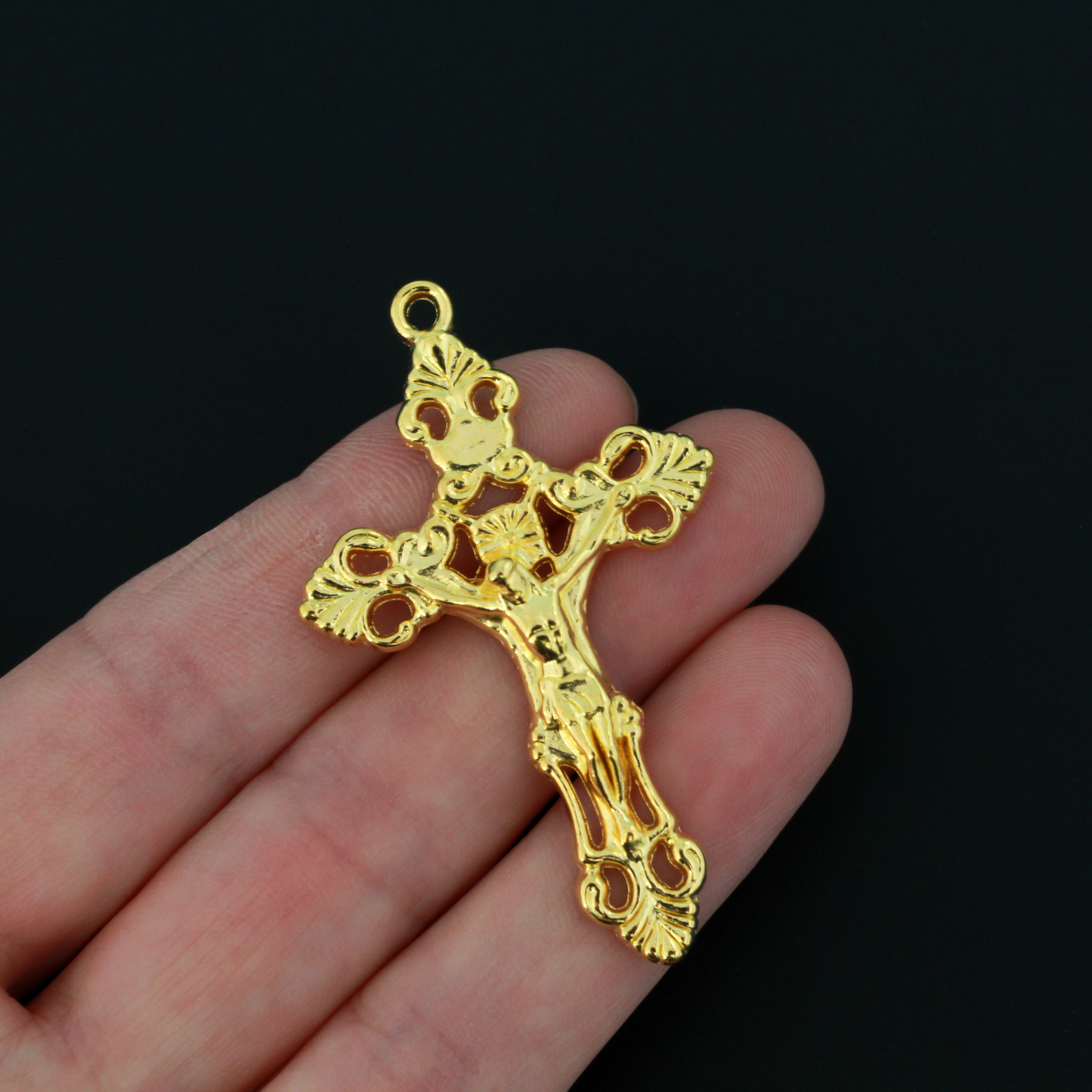 Three ornate fleur de lis crucifix cross in a shiny gold color and filigree cut out design, 2-1/8" long