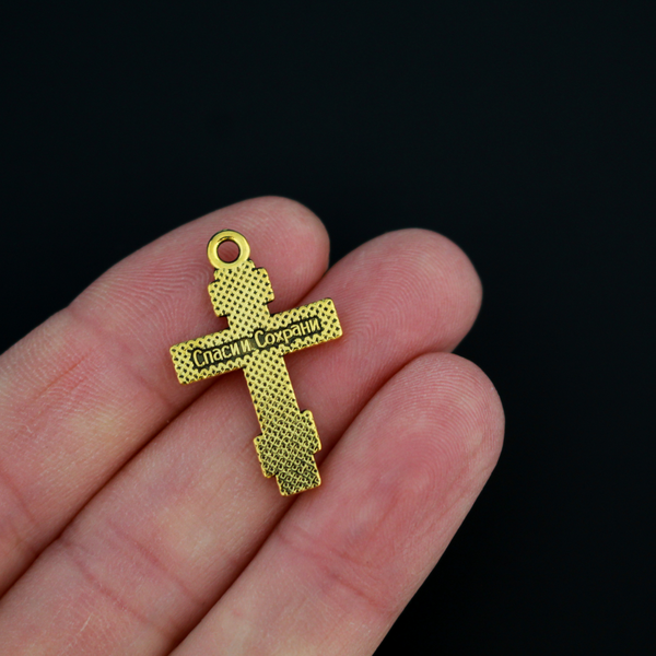 Eastern Orthodox crucifix charms in an antiqued gold finish, one inch long