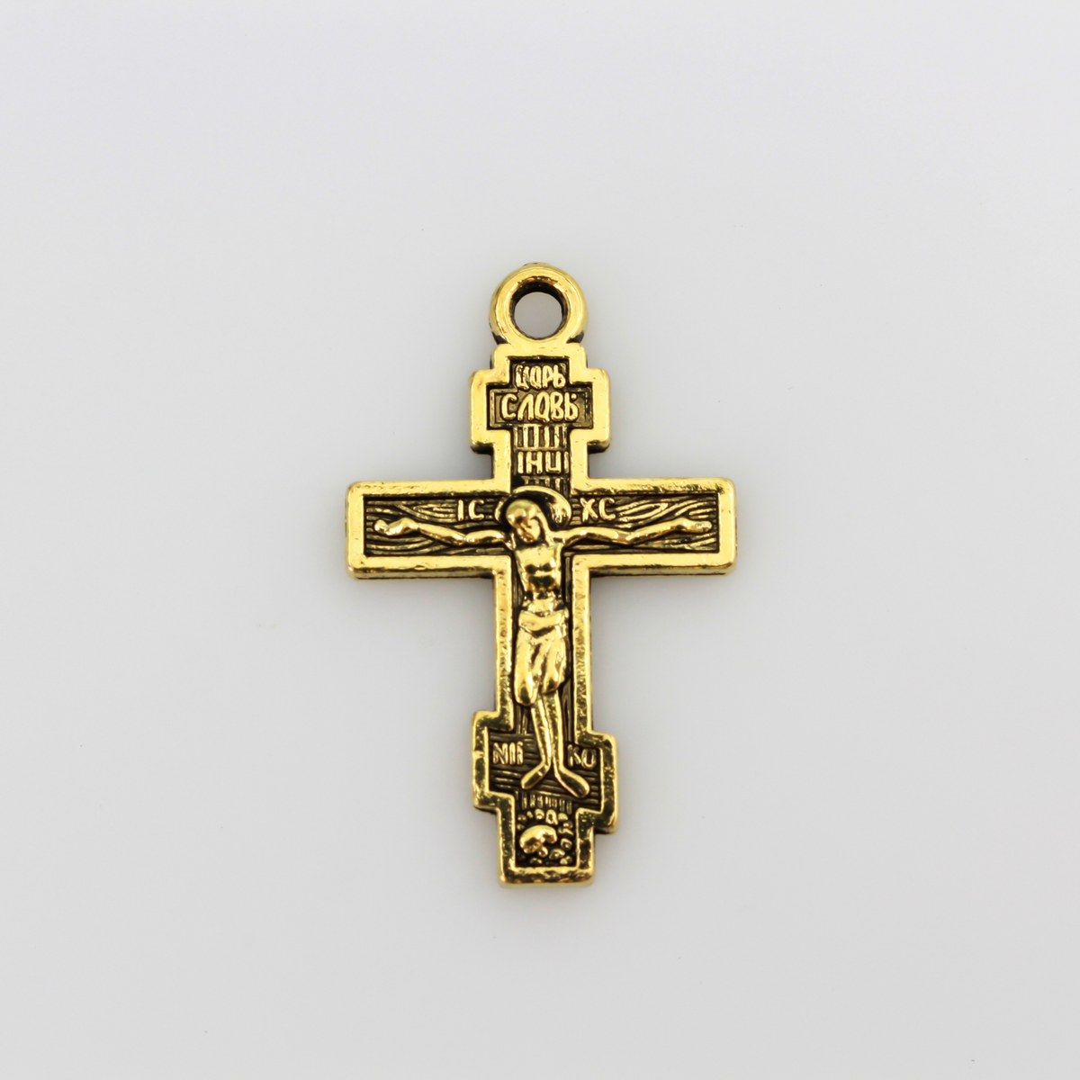 Eastern Orthodox crucifix charms in an antiqued gold finish, one inch long