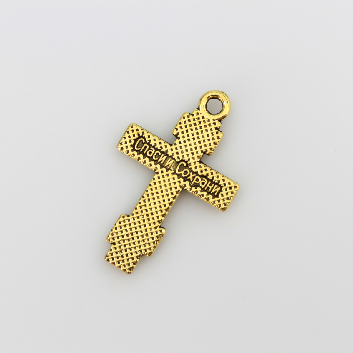 Eastern Orthodox crucifix charms in an antiqued gold finish, one inch long