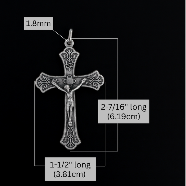 Large ornate crucifix with flared edges. Beautiful raised relief scroll work pattern on the bars of the cross.