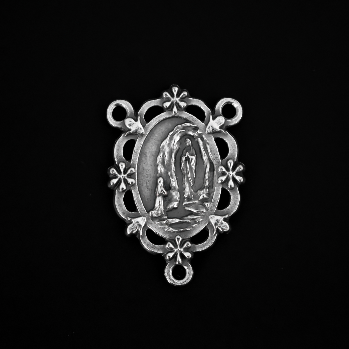 Our Lady of Lourdes rosary centerpiece. This silver oxidized rosary centerpiece has gorgeous details with filigree cut out design and floral detailing