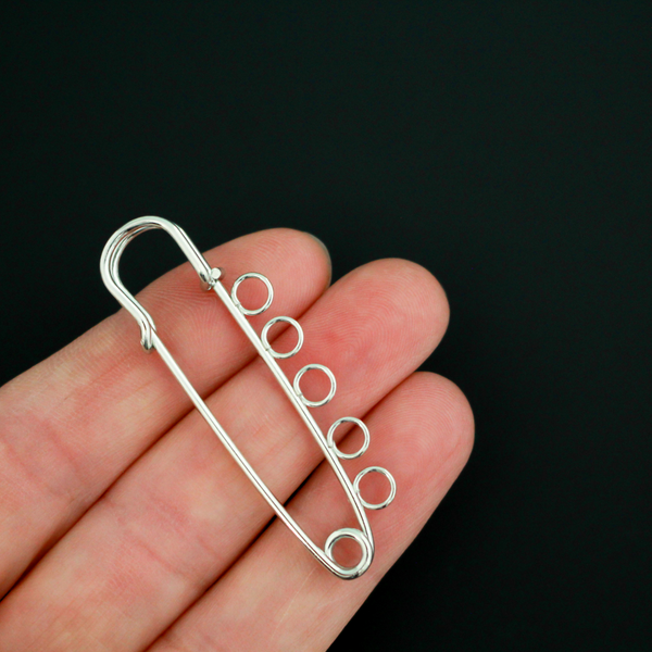 Safety pin brooch pin with five loops so you can easily attach your patron saint medals