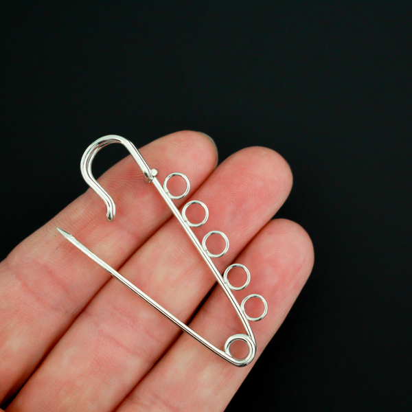 Safety pin brooch pin with five loops so you can easily attach your patron saint medals