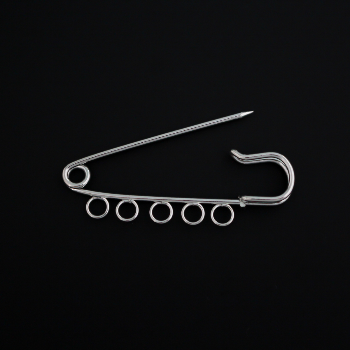 Safety pin brooch pin with five loops so you can easily attach your patron saint medals