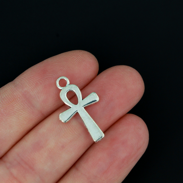 Egyptian Ankh cross charms that are a zinc alloy base with a shiny silver plating